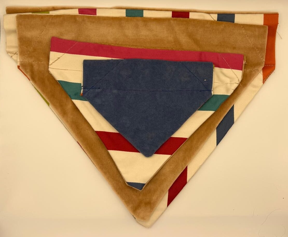 Velvet vintage striped dog bandana with collar sleeve in cream, red, teal and navy stripe layered over tan velvet, handmade